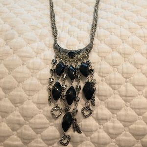 Black and silver metal necklace with dangles